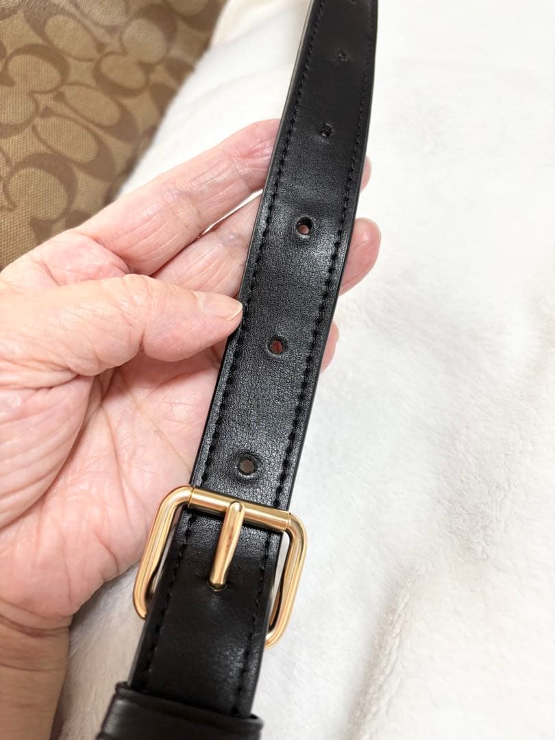 COACH パッチ付きボディバッグ