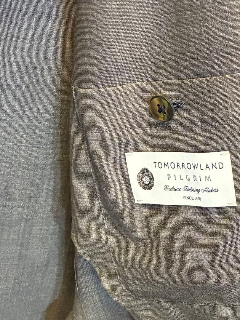 新品タグ付きグレースーツTOMORROWLAND 50サイズ