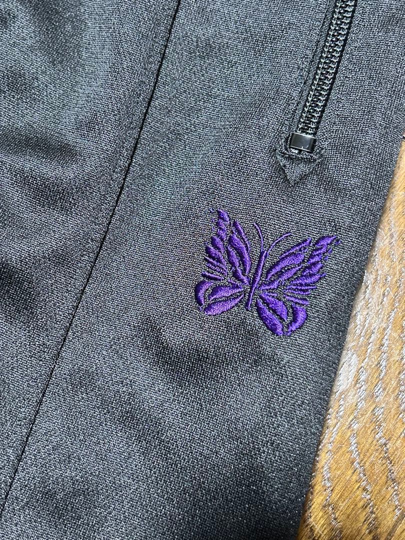 【Needles】H.D.TRACK PANTS BLACK×PURPLE