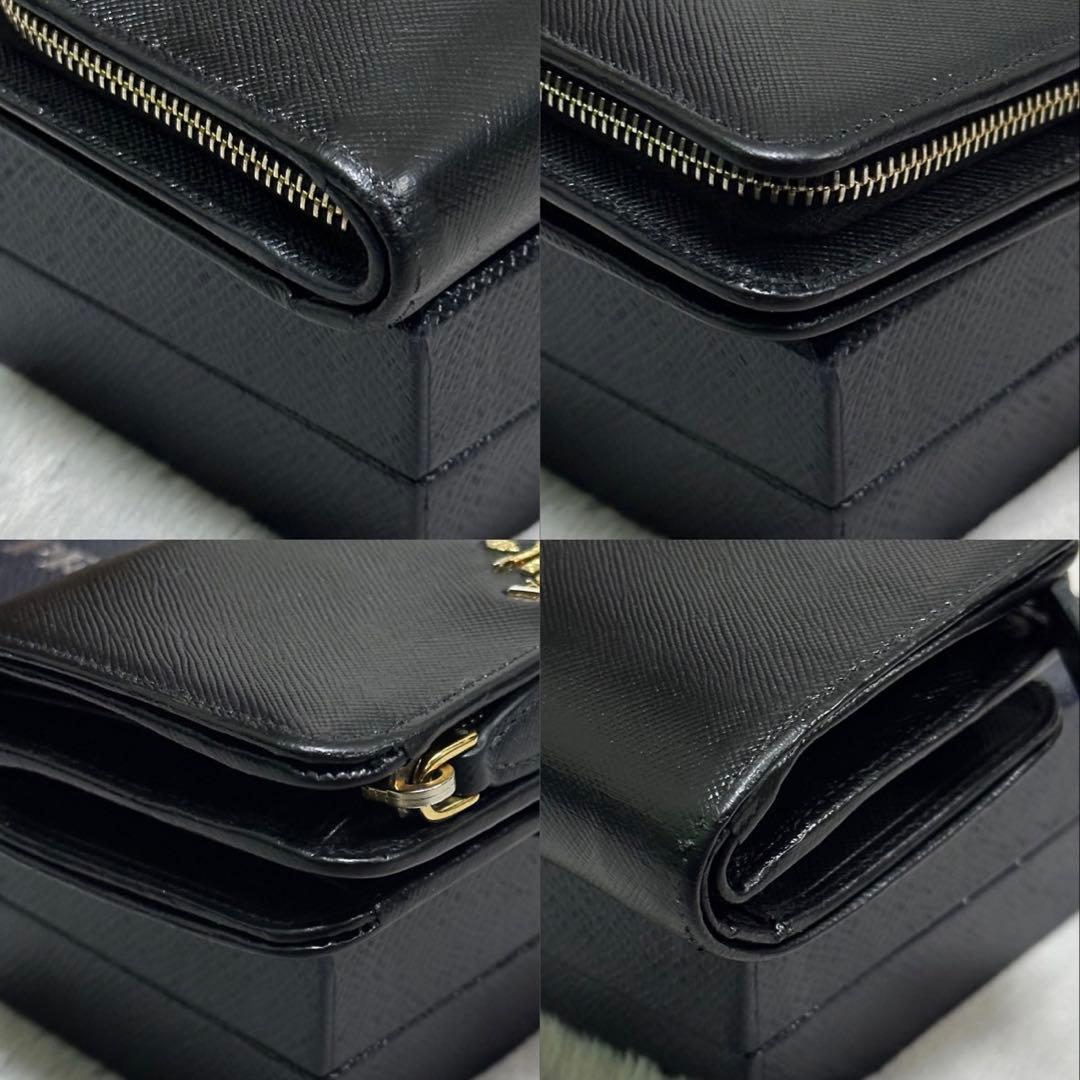 PRADA 折り財布　ゴールドロゴ　ブラック　ラウンドジップ　サフィアーノレザー