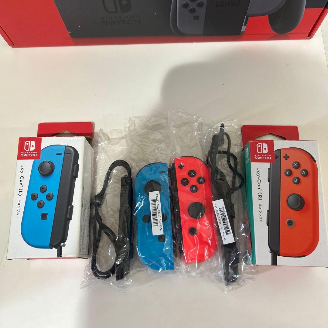 Nintendo Switch 本体 + ジョイコン2個＋ストラップ１つ
