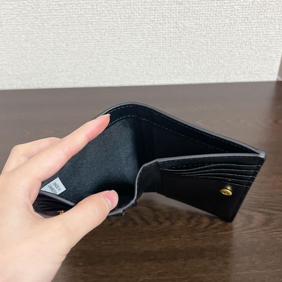 トリーバーチ　財布　ブラック　ゴールド　二つ折り財布　ミディアムウォレット