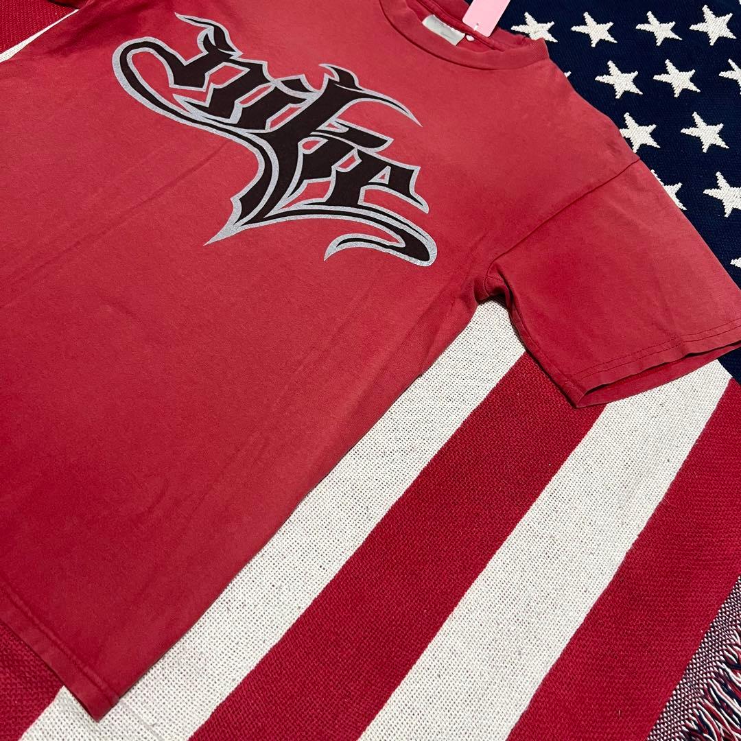 NIKE ナイキ グラフィックロゴTシャツ y2k フェードサーモンピンク