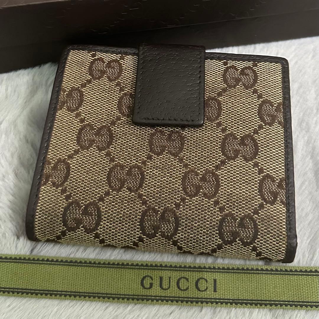 GUCCI グッチ　折り財布　キャンバス　メタルロゴ　GG ブラウン