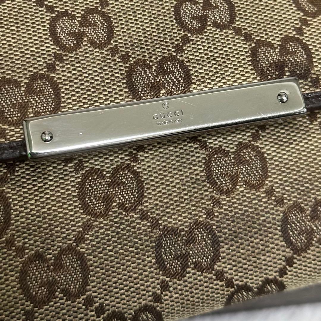 GUCCI グッチ　折り財布　キャンバス　メタルロゴ　GG ブラウン