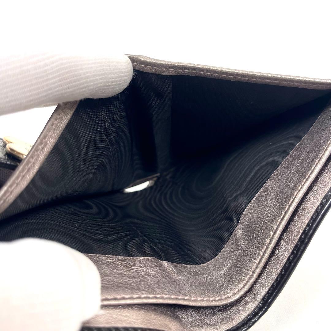 グッチ　折り財布　ハートロゴプレート　GGシマレザー　総柄エンボス　コンパクト
