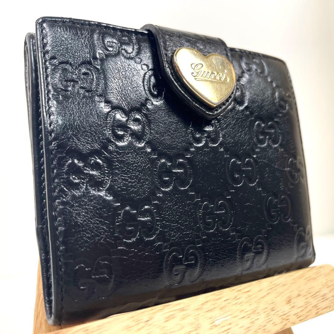 グッチ　折り財布　ハートロゴプレート　GGシマレザー　総柄エンボス　コンパクト