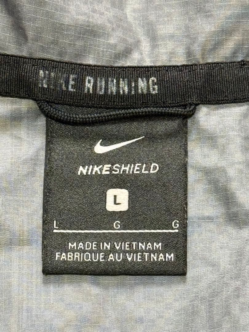 ナイキ シールドレーサーNIKE ナイロンパーカー ランニング L