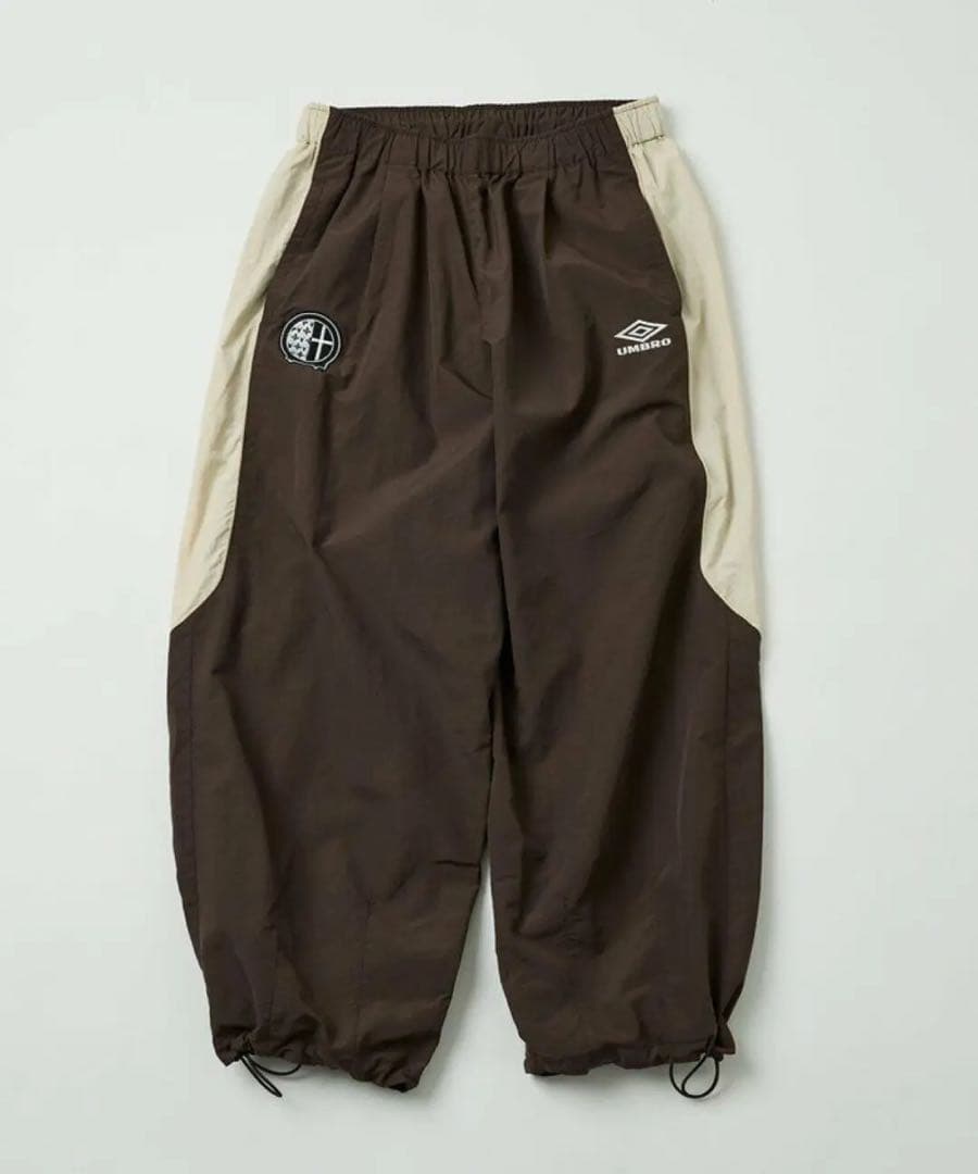 さ*る様 UMBRO go!go!vanillas ナイロントラックパンツ ブラ