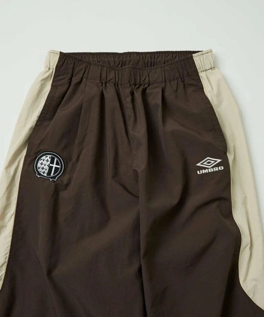 さ*る様 UMBRO go!go!vanillas ナイロントラックパンツ ブラ