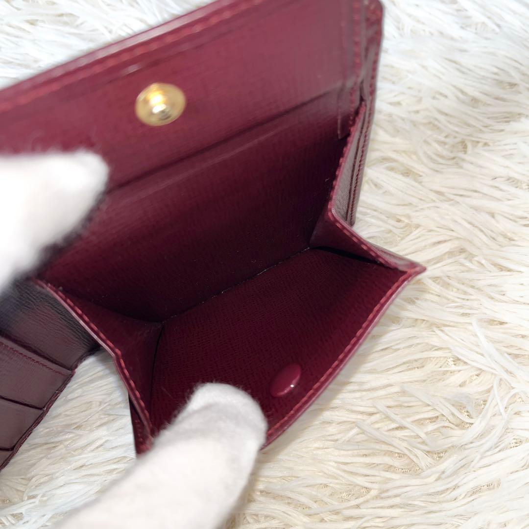 新品✨Cartierカルティエ　二つ折り財布　ボルドー　レザー　マストライン