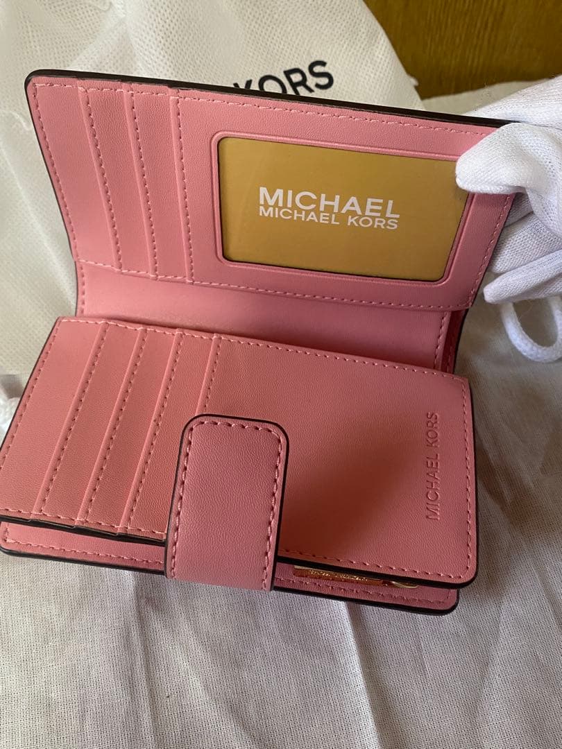 【新品 未使用】MICHAEL KORS ピンク 二つ折り財布
