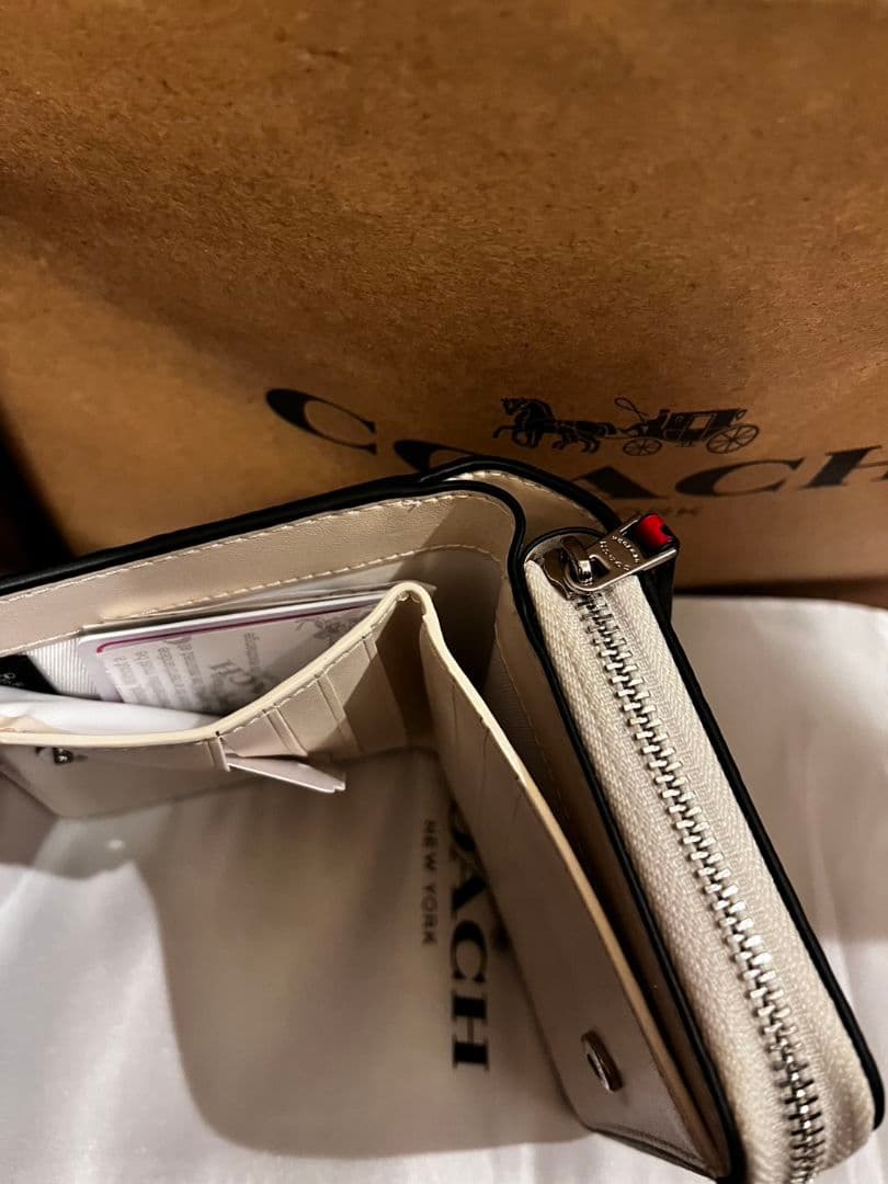COACH ストロベリー柄 二つ折り財布