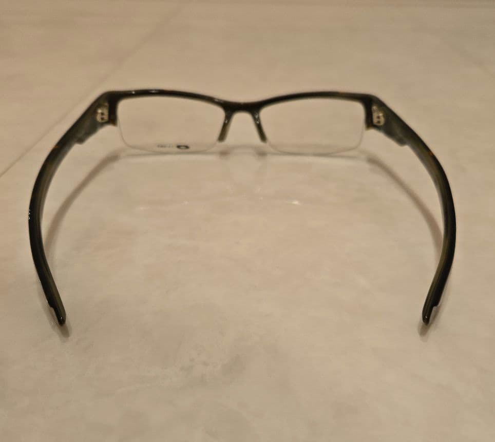 Oakley ブラック サングラス ハーフリム