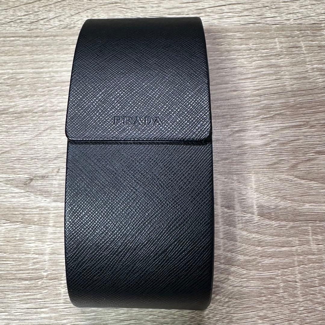 PRADA SPR 27L ブラックレディースサングラス 57◻︎17-135