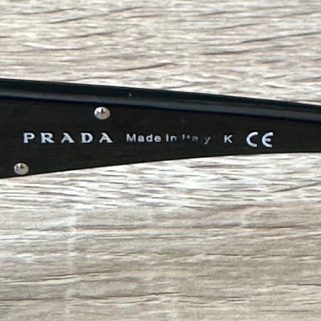 PRADA SPR 27L ブラックレディースサングラス 57◻︎17-135