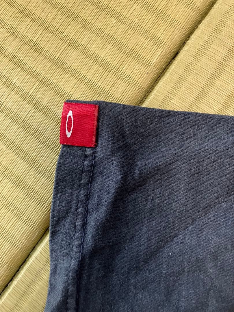 ビンテージoakley オークリーTシャツ　XL サロモン　フェイド日焼け墨黒