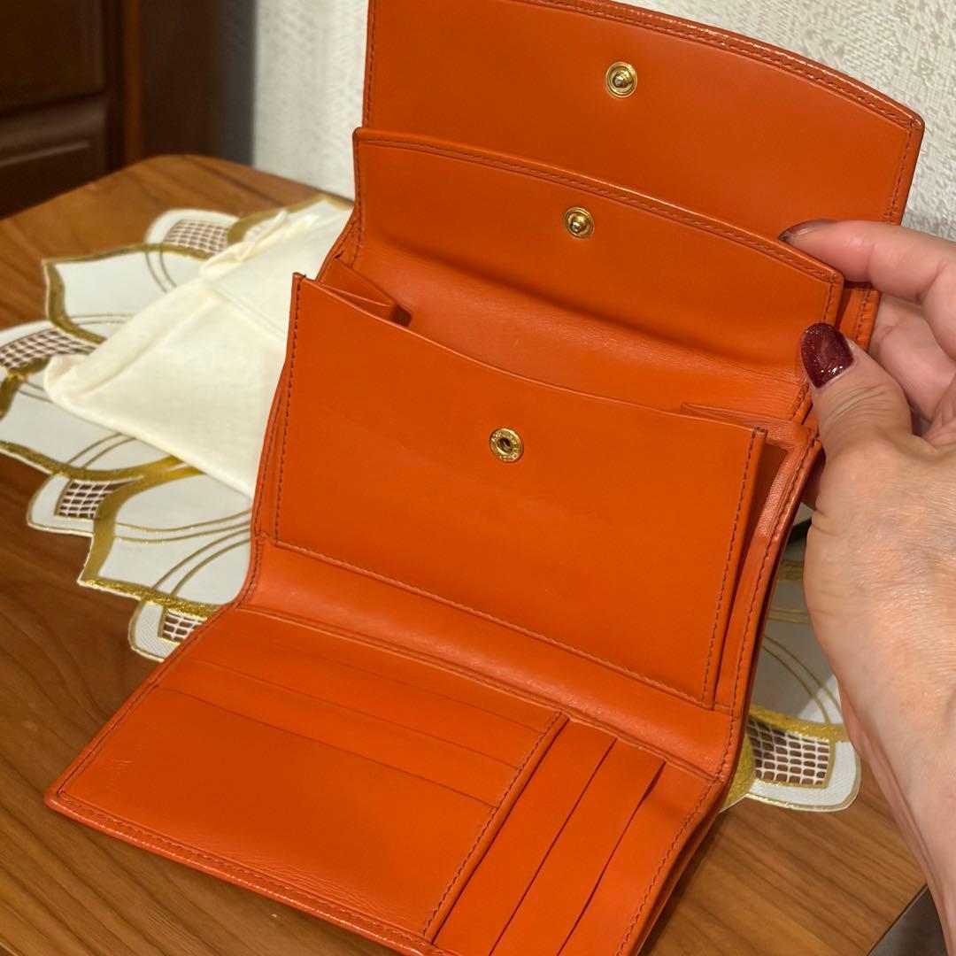 ミキティラブさま　ハンティングワールド オレンジ レザー 二つ折り財布