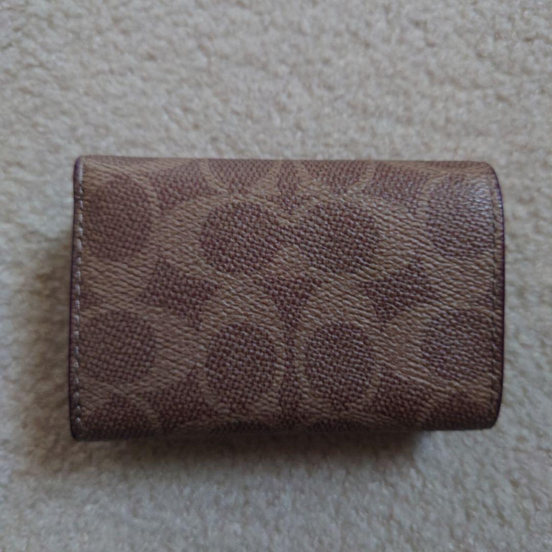 COACH ミニトライフォールド　ウォレットシグネチャーキャンパス財布