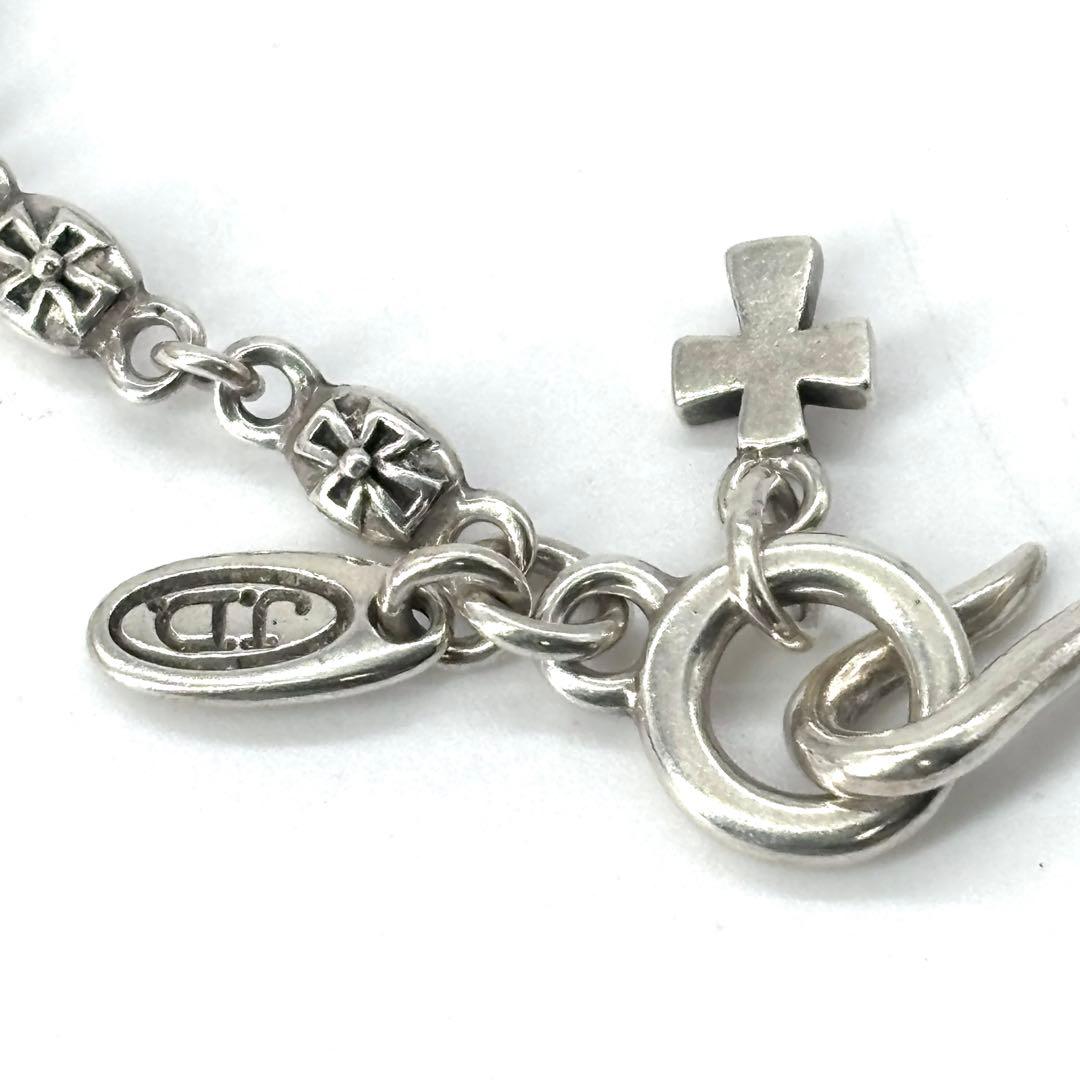 アクセサリー JUSTIN DAVIS CROSS WITH CROWN TINY CROSS
