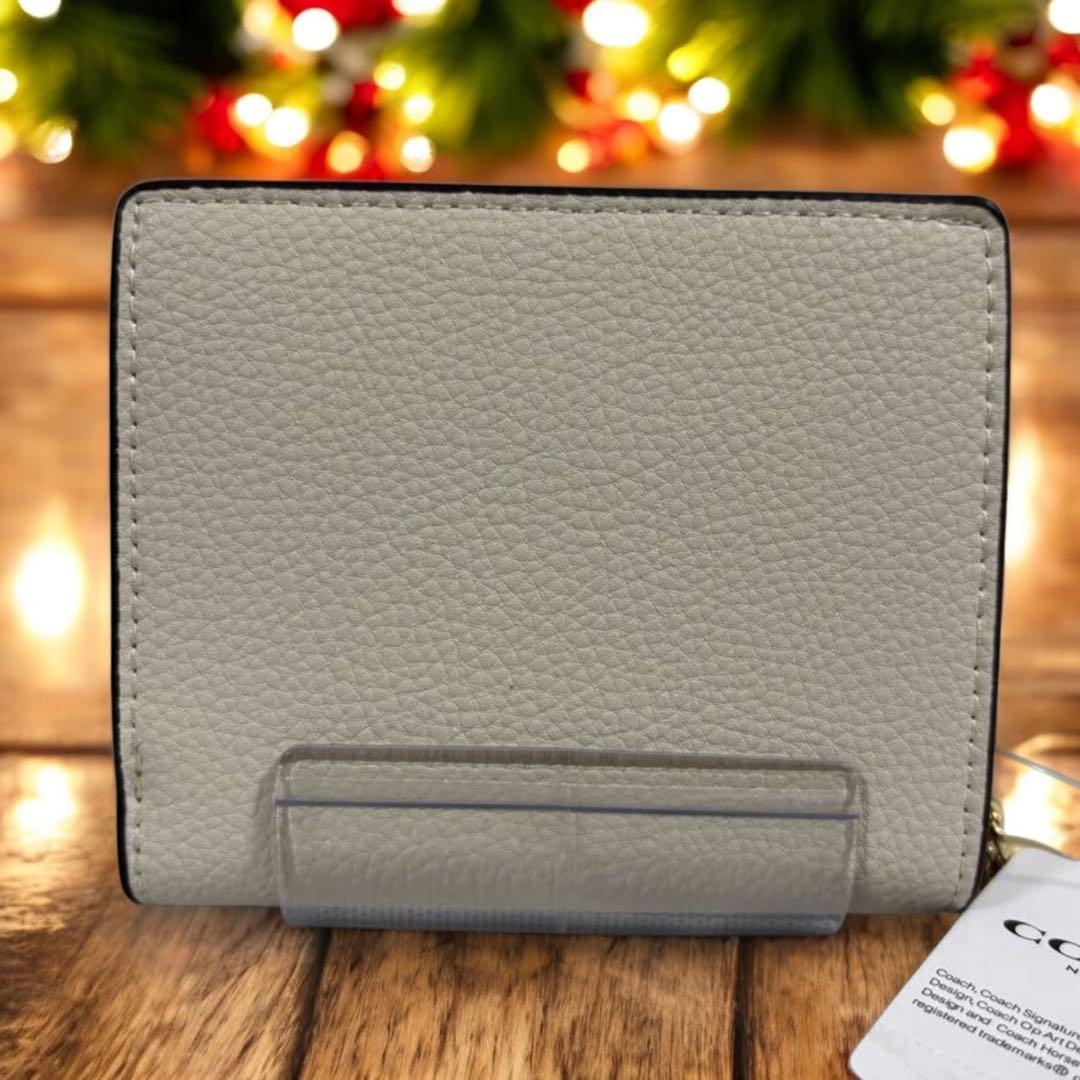 【新品未使用 】COACH 猫プリント 二つ折り財布 白 CC472