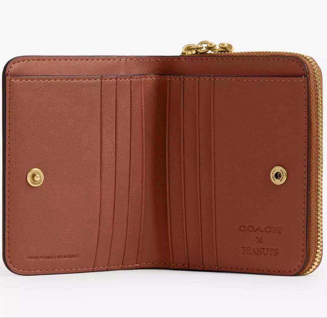 ポポロ❣️Coachコーチ スヌーピー ピーナッツ二つ折り財布 ブラウン新品