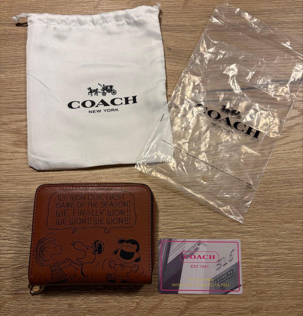 ポポロ❣️Coachコーチ スヌーピー ピーナッツ二つ折り財布 ブラウン新品