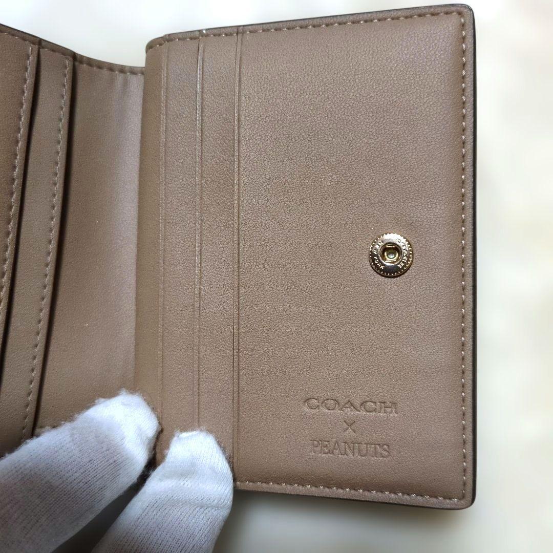 コーチ　スヌーピー　コラボ　二つ折り財布　シグネチャー