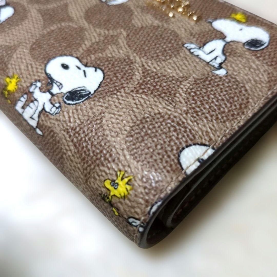コーチ　スヌーピー　コラボ　二つ折り財布　シグネチャー