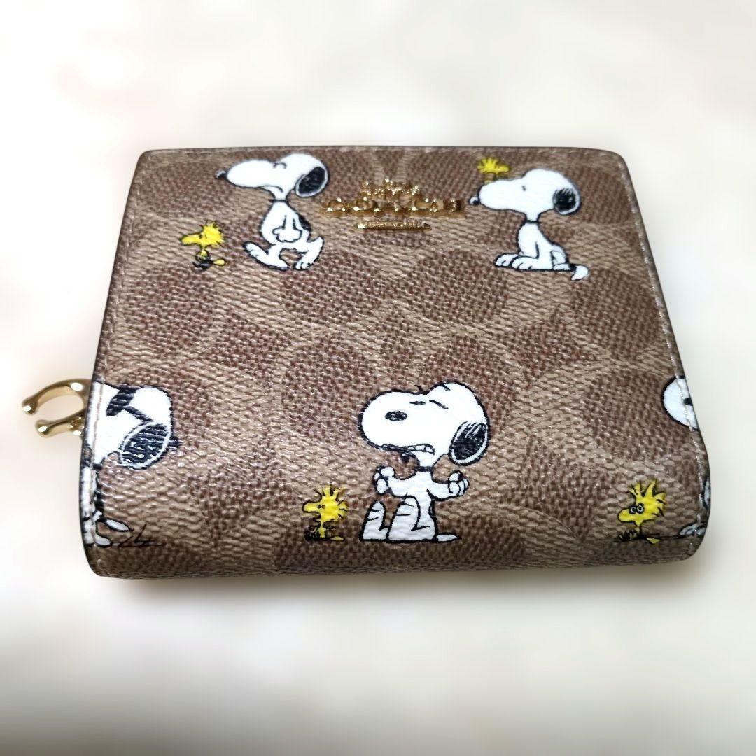 コーチ　スヌーピー　コラボ　二つ折り財布　シグネチャー