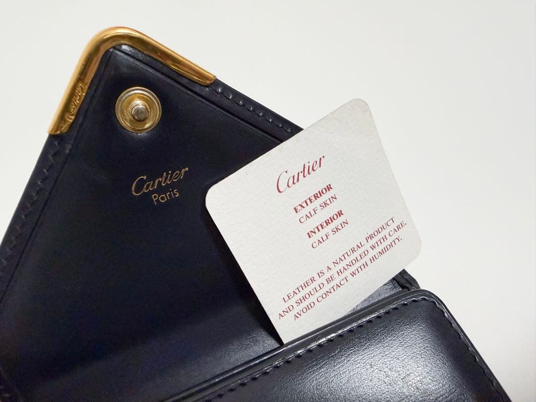 【美品】カルティエ 3つ折りサイフ サファイアライン がま口 カーフレザー 紺