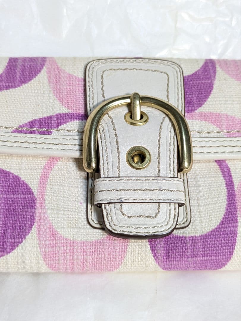 COACH コーチ　三つ折り財布 ピンクと紫のパターンシグネチャー未使用品
