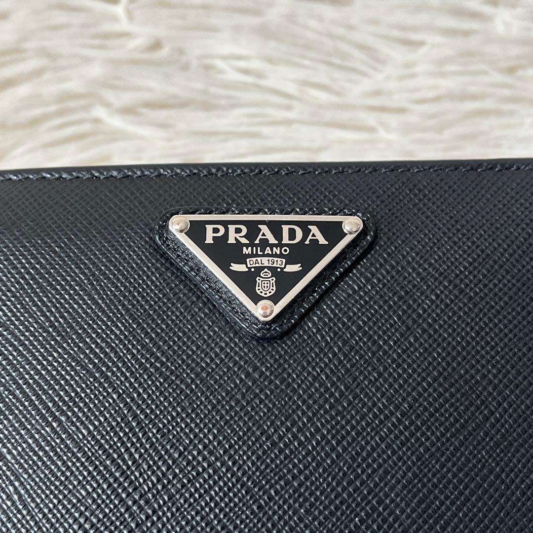 美品✨PRADA プラダ　三角ロゴ　二つ折り財布 サフィアーノ　1ml018 黒