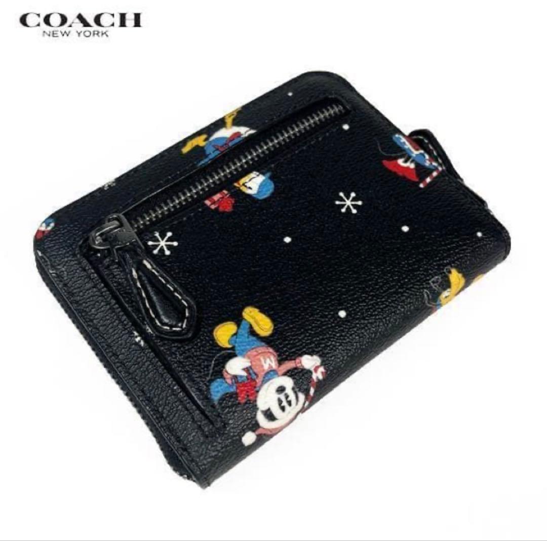 COACH / コーチ ミッキーマウス グーフィー ドナルドコンパクト二つ折財布
