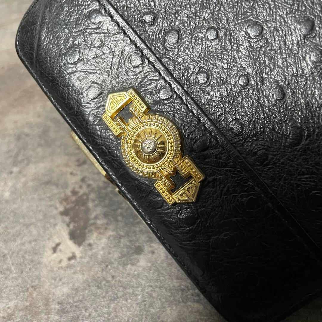 VERSACE ヴェルサーチ 黒 レザー 二つ折り財布 金具付き がま口