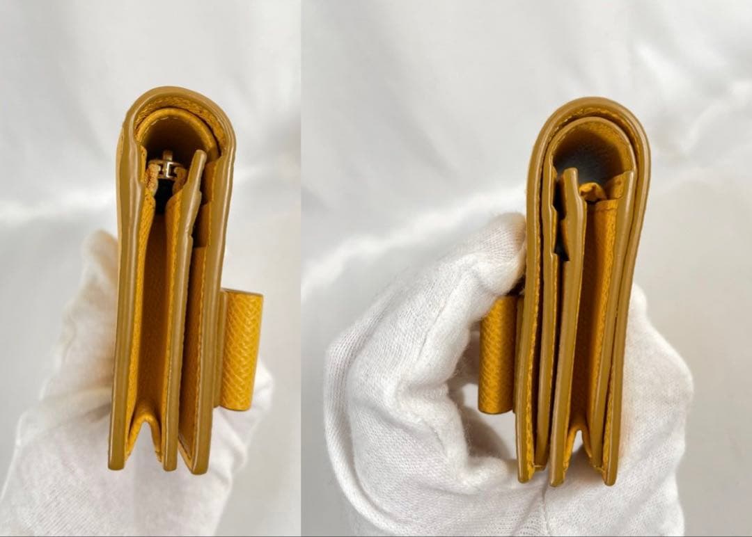 未使用に近い FERRAGAMO フェラガモ 二つ折り財布 ヴァラリボン 箱付き