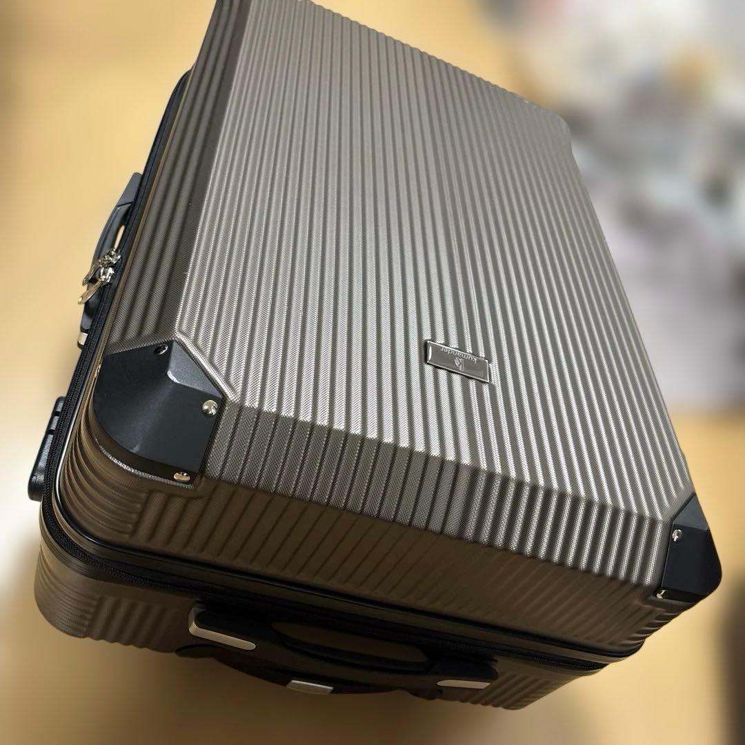 機内持ち込み不可　中サイズスーツケース66×44×27 ブロンズブラウン片道使用