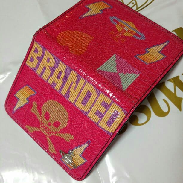 処分 お値下可 Vivienne Westwood ピンク 定期入れ ドクロ