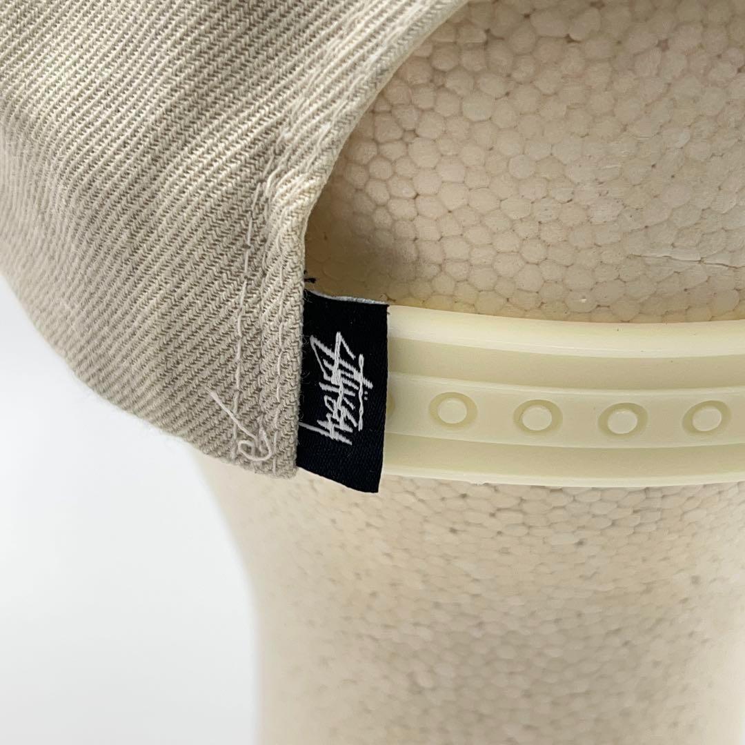 【STUSSY】ロゴ刺繍 スナップバックキャップ ウール紺 ベージュ系 OSFA