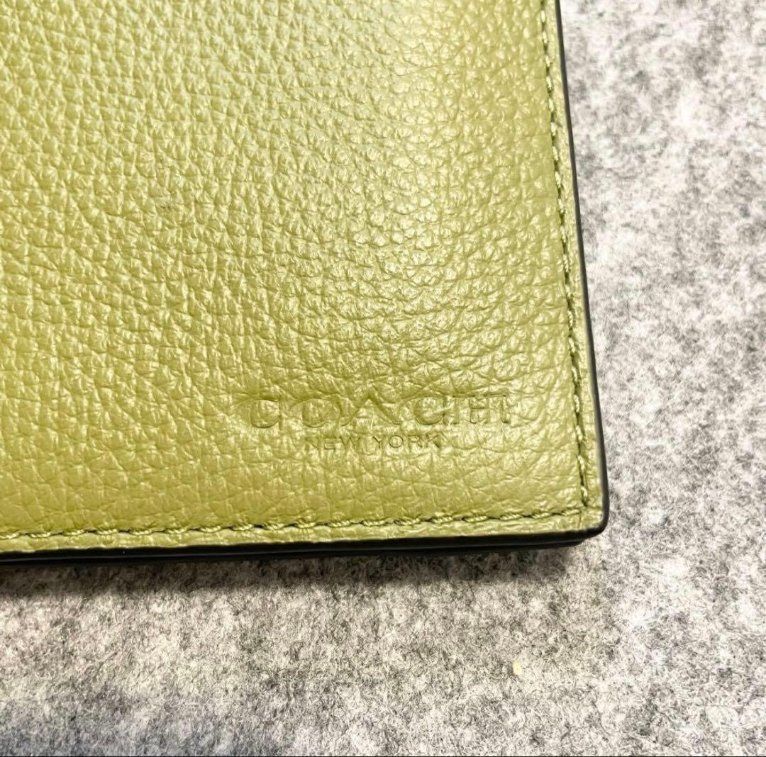 COACH マネークリップ　二つ折り財布　小銭入れあり　グリーン系