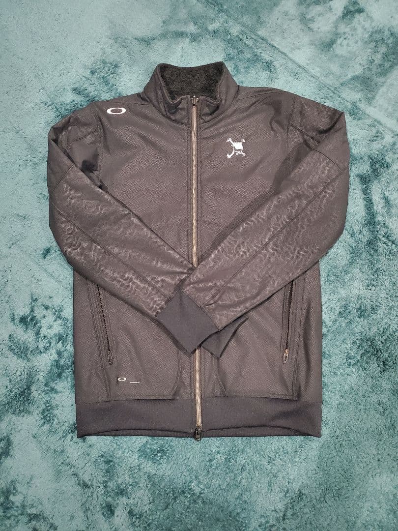 完売品 オークリー REVERSIBLE WIND JACKET