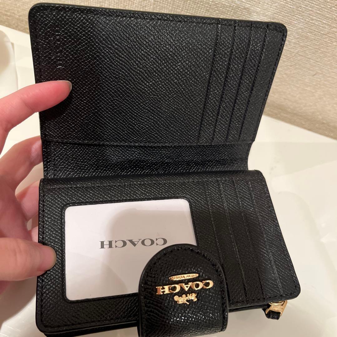COACH 二つ折り財布　さくらさくらこです。