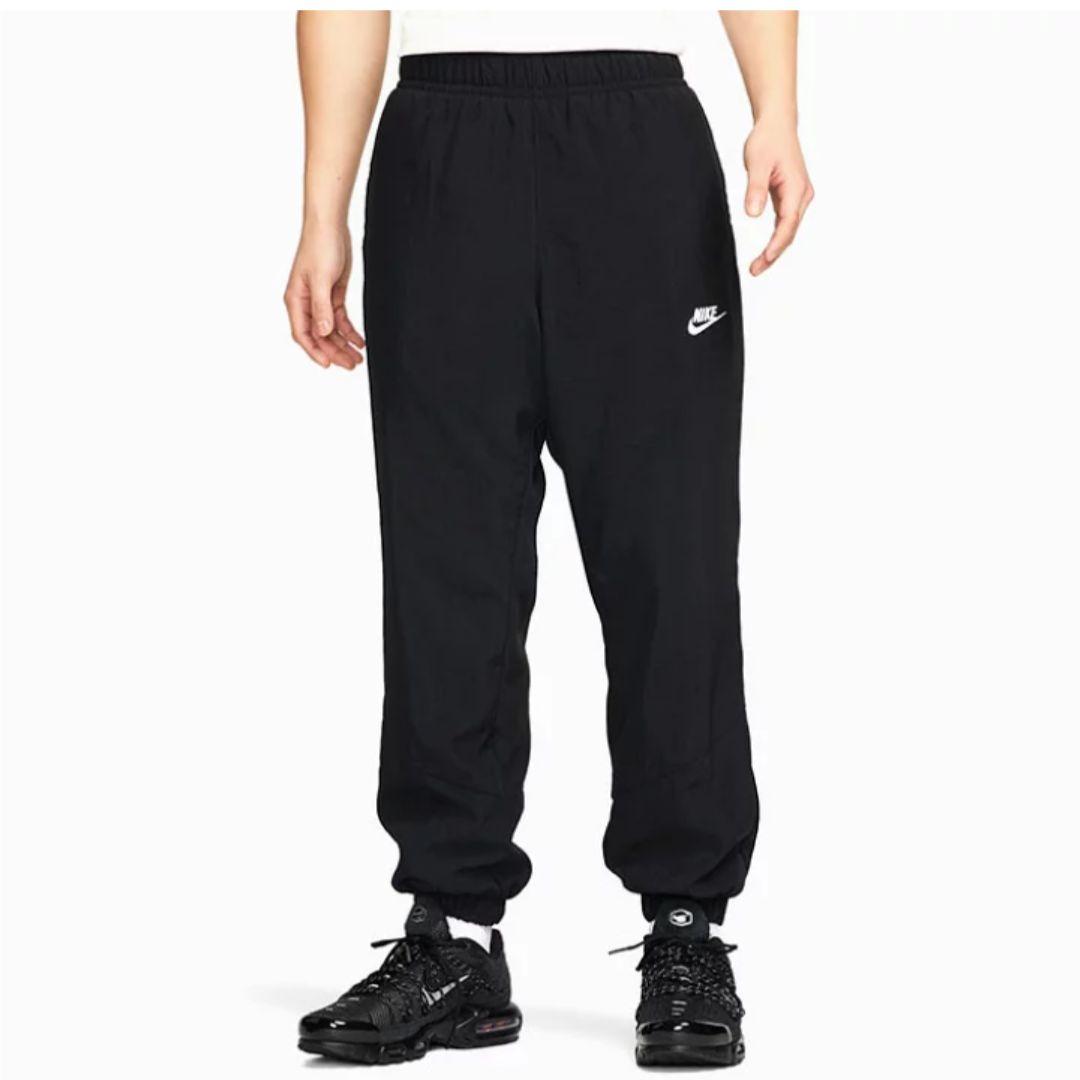新品 NIKE ナイキ ナイロンウーブンパンツ 裏起毛