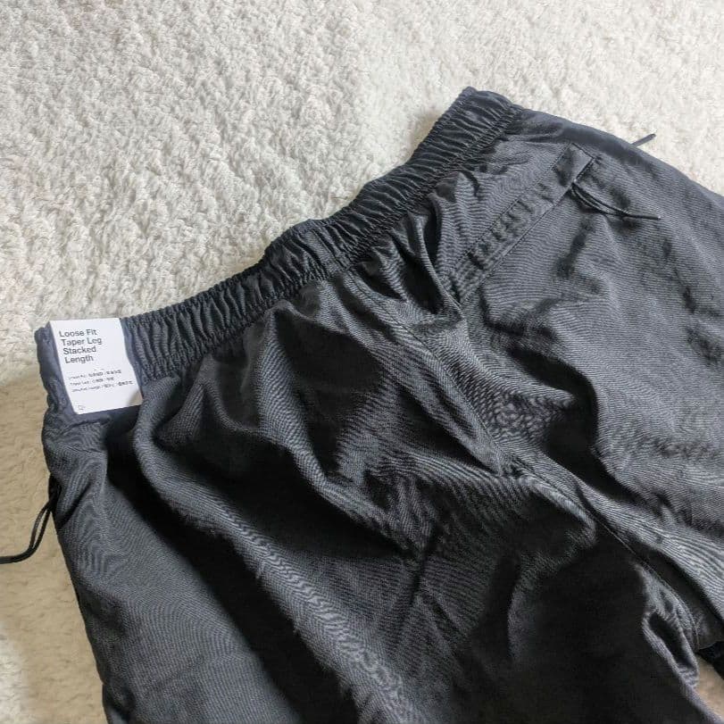 新品 NIKE ナイキ ナイロンウーブンパンツ 裏起毛