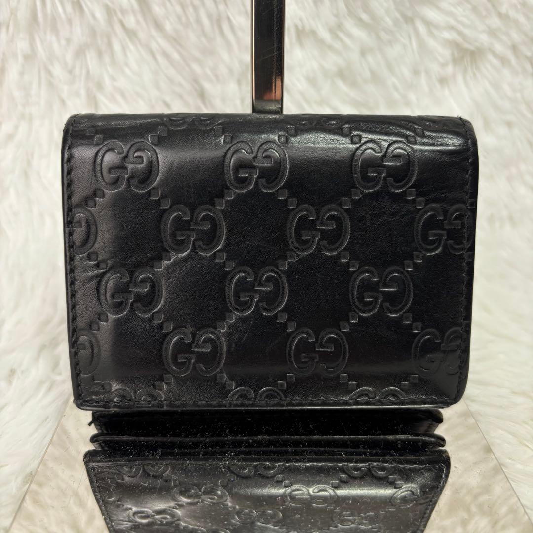 ✨高級✨ グッチ 二つ折り財布 シマ ドリアン GG柄 レザー シグネチャー 黒