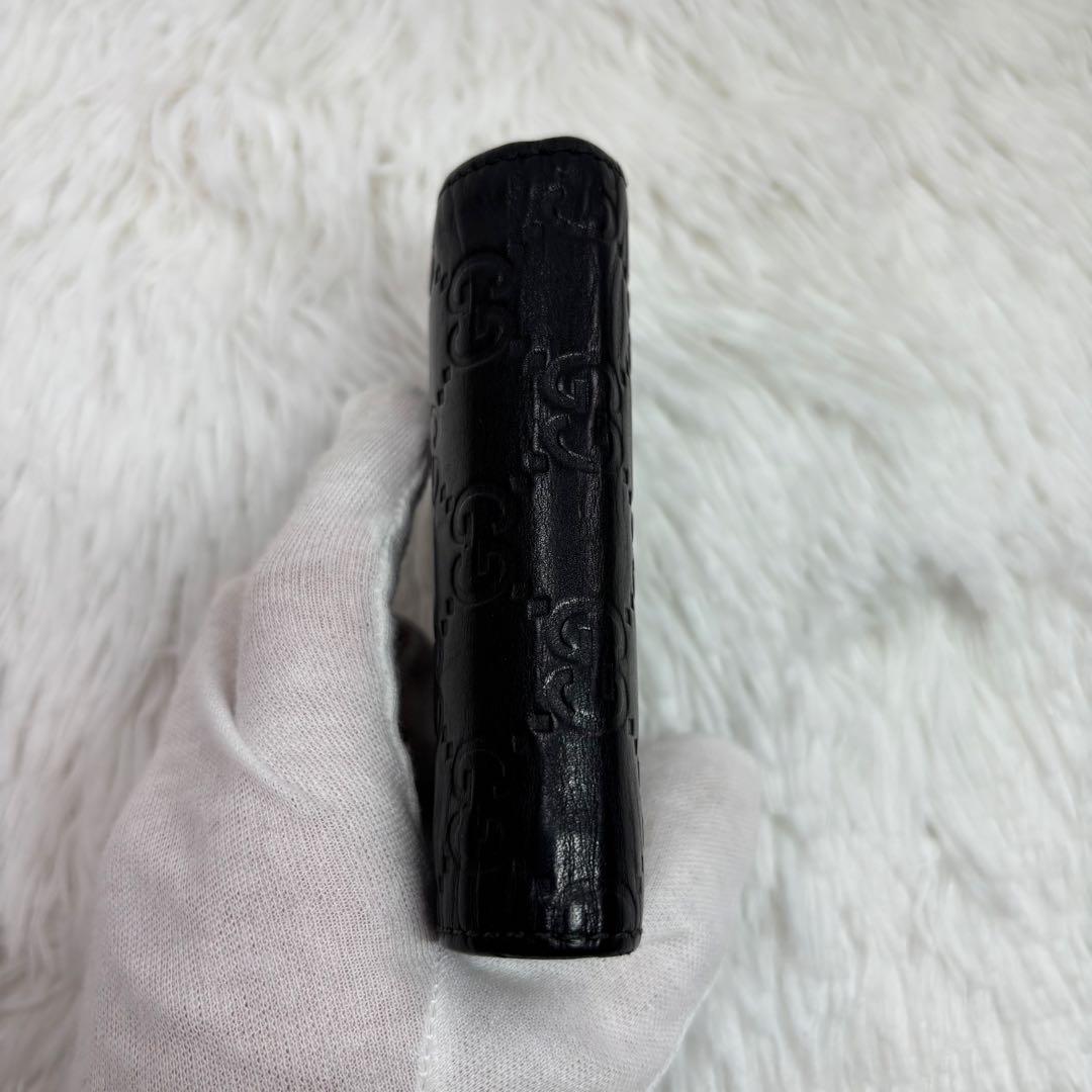 ✨高級✨ グッチ 二つ折り財布 シマ ドリアン GG柄 レザー シグネチャー 黒