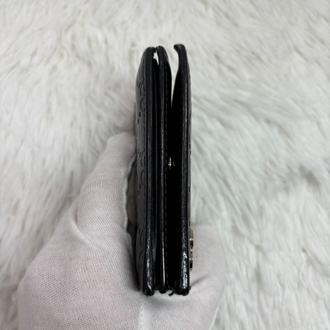 ✨高級✨ グッチ 二つ折り財布 シマ ドリアン GG柄 レザー シグネチャー 黒