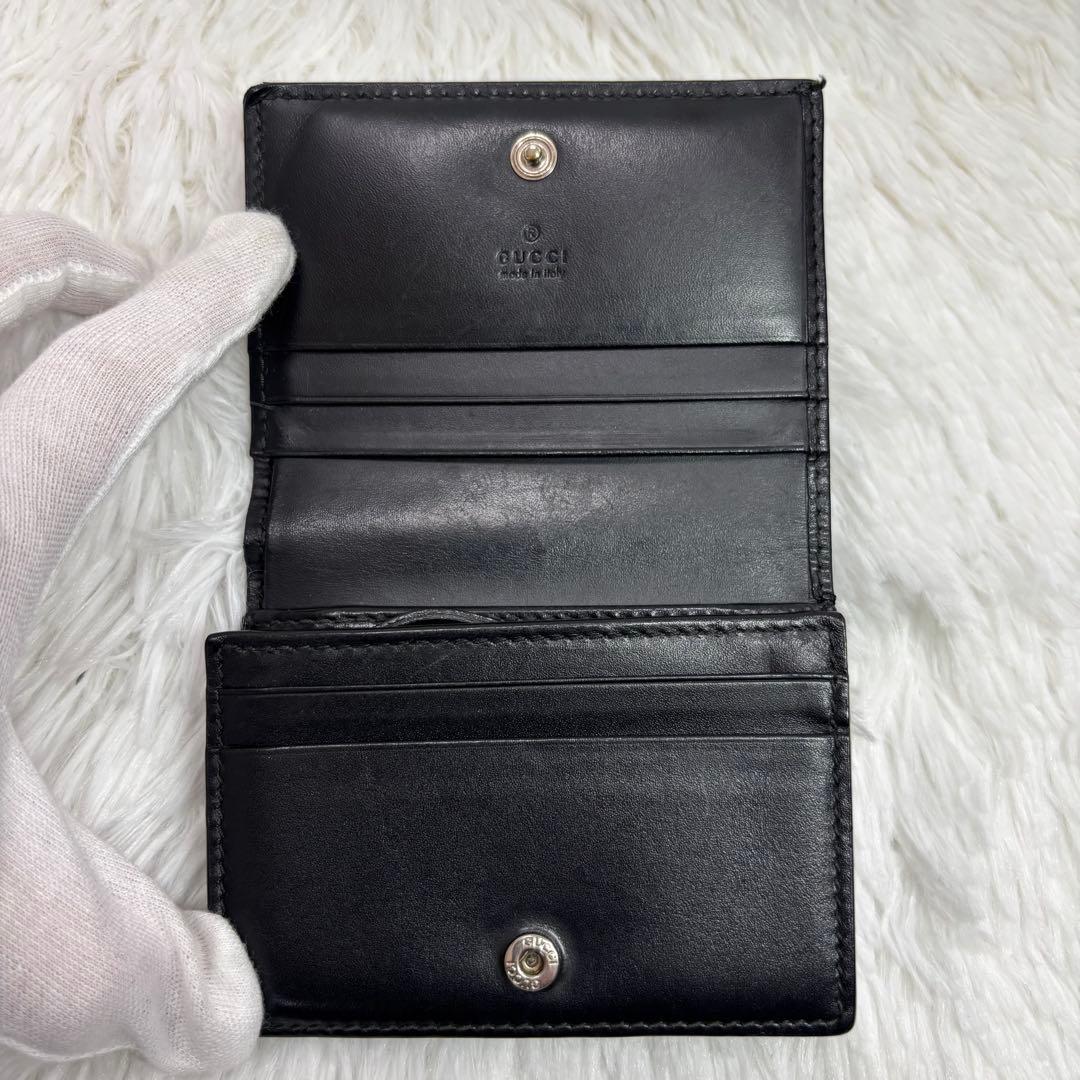 ✨高級✨ グッチ 二つ折り財布 シマ ドリアン GG柄 レザー シグネチャー 黒