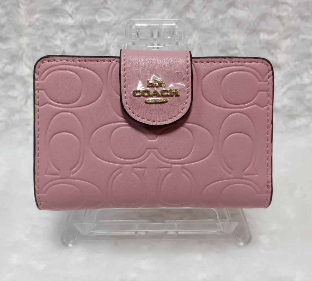 COACH　二つ折り財布　型押し　ピンク