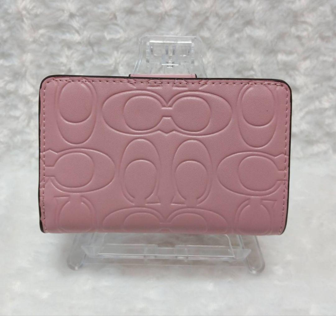 COACH　二つ折り財布　型押し　ピンク